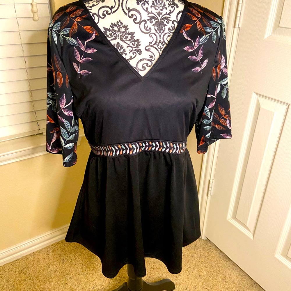 Top sized Medium. Rosewe brand.